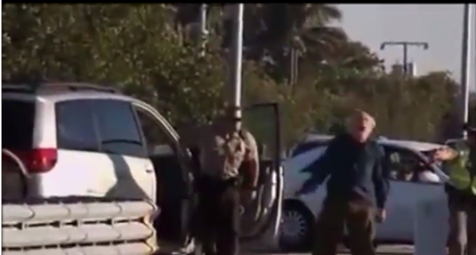 Police Taser Elderly Man Holding His Hands Up
